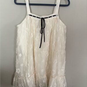 White Sleeveless Dress with Black Ribbon